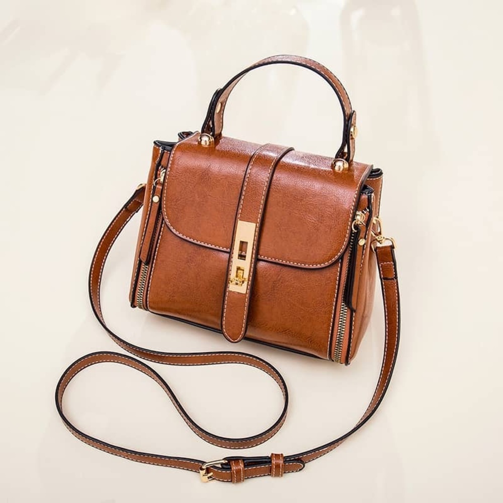 Aries Vegan Leather Cross Body Purse: Brown